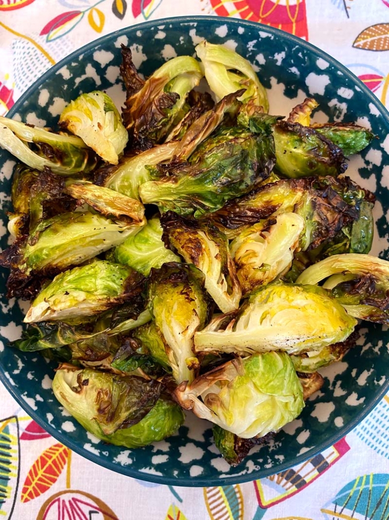 Air Fryer Brussels Sprouts in a blue and white bowl