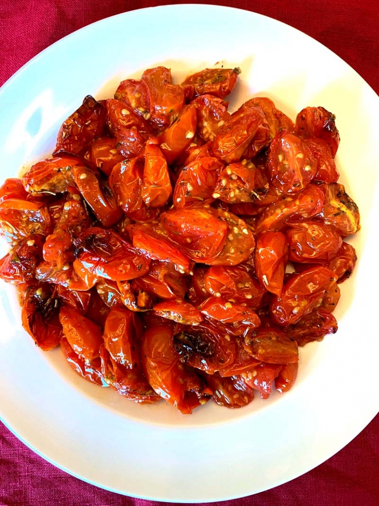air fried cherry tomatoes on a white plate 