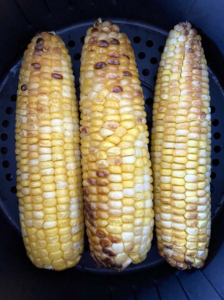 air fryer corn on the cob in an air fryer basket 