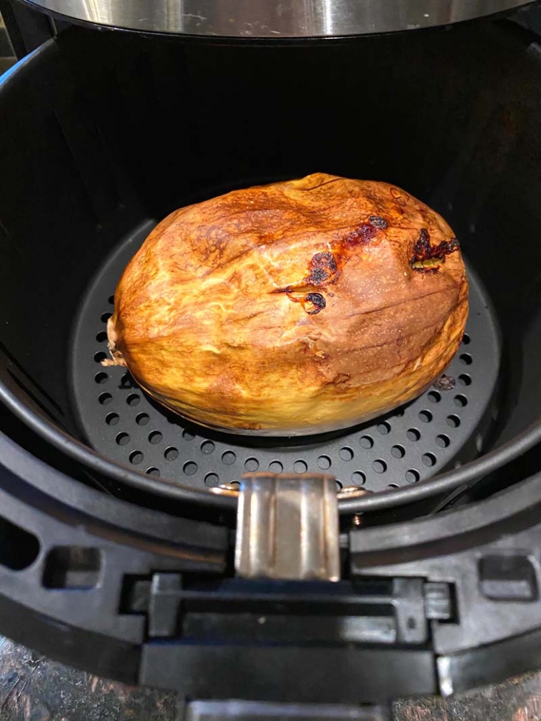 roasted spaghetti squash in an air fryer basket 