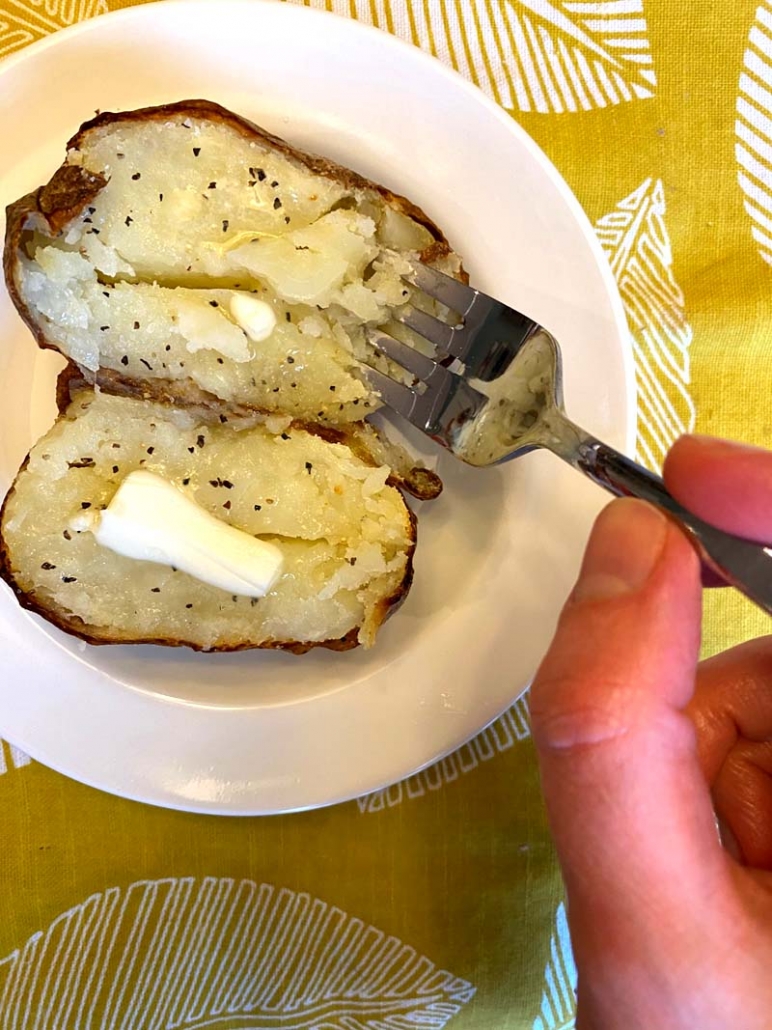 baked potato with salt pepper and butter