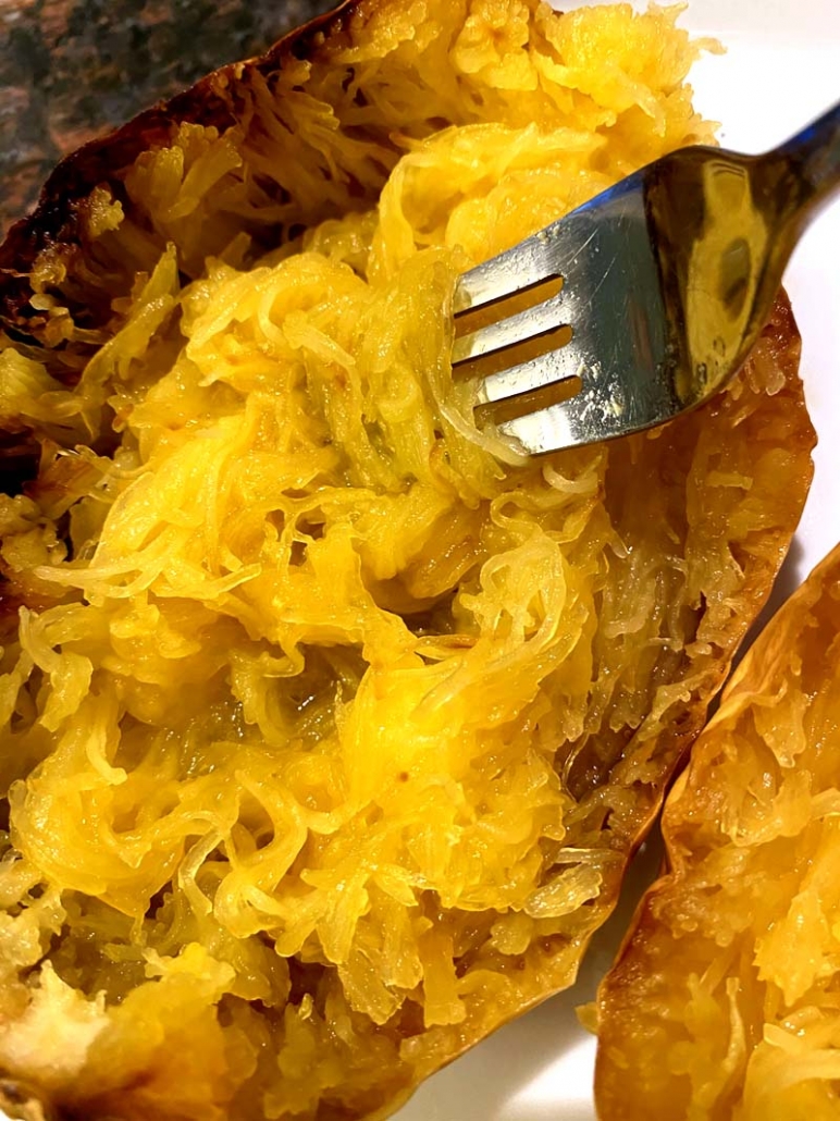 shredded spaghetti squash with a fork