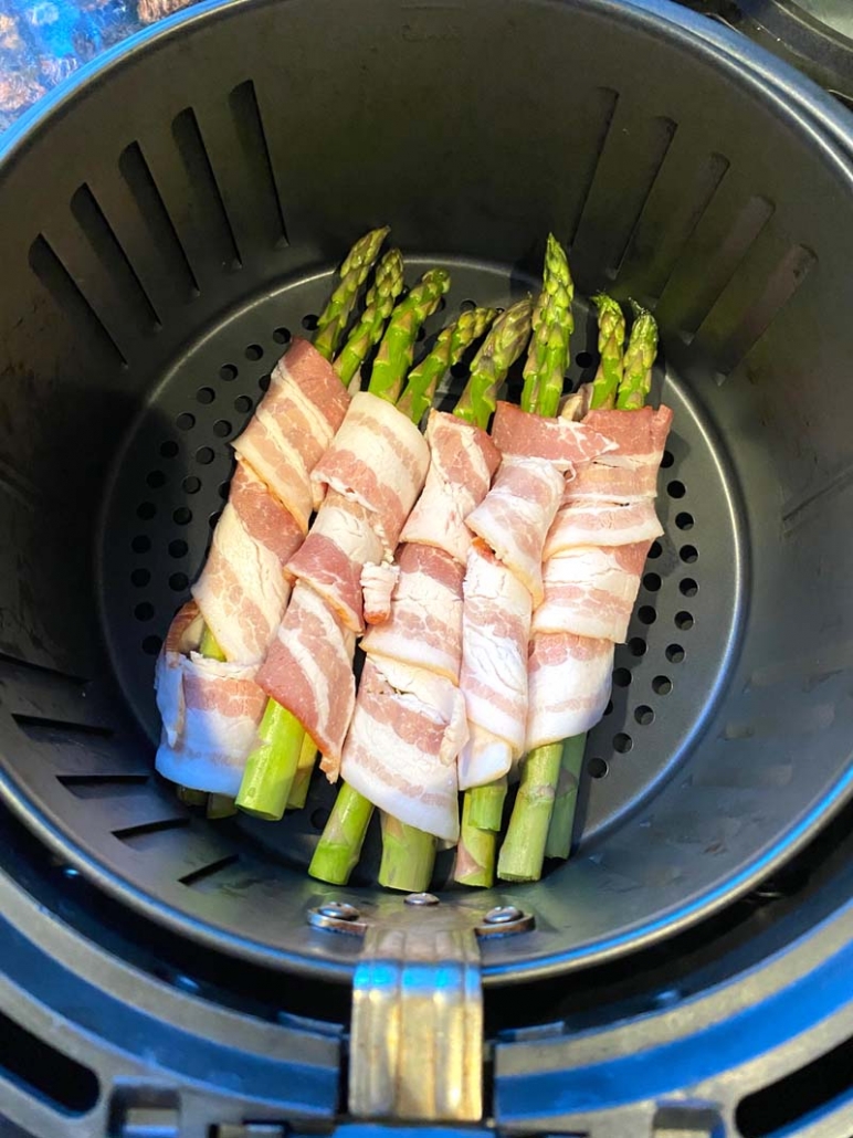 cooking asparagus wrapped with bacon in an air fryer
