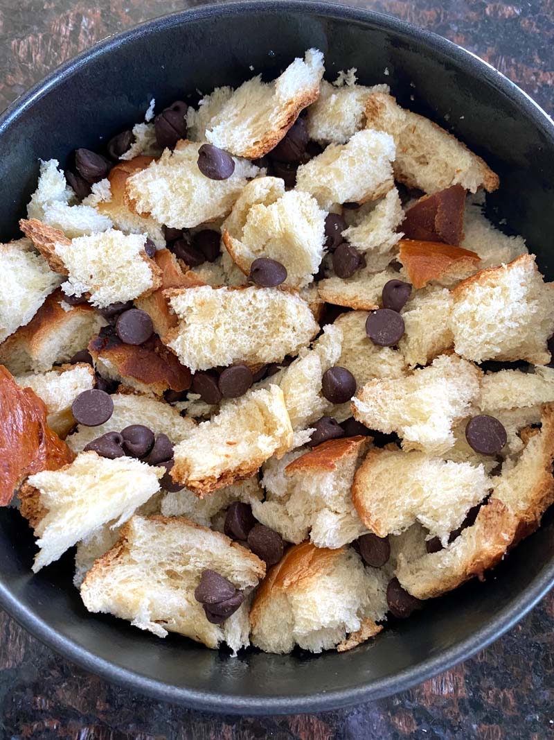 Bread and chocolate chips in a pan