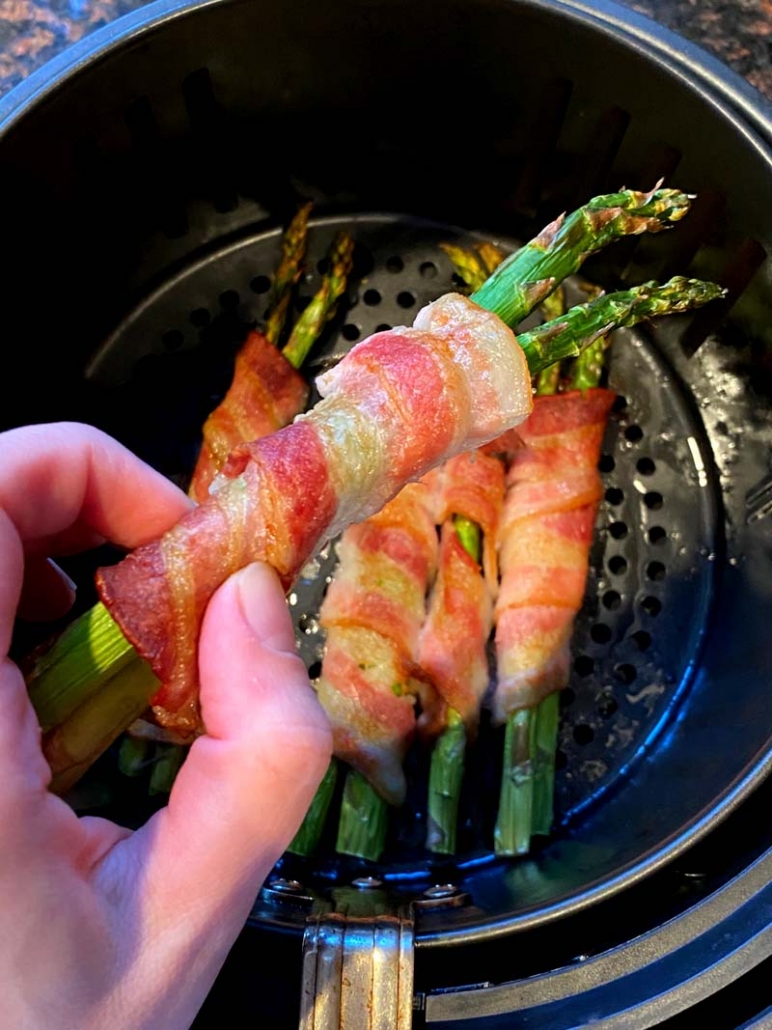 2 asparagus spears wrapped in bacon