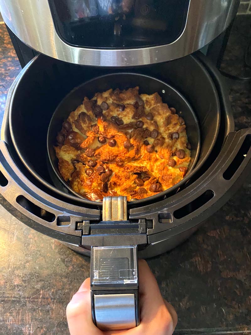 Removing the bread pudding from the air fryer