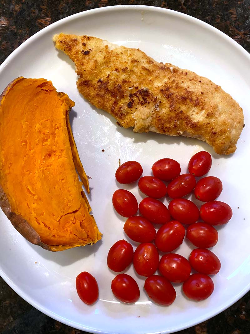 Almond flour chicken served with a sweet potato