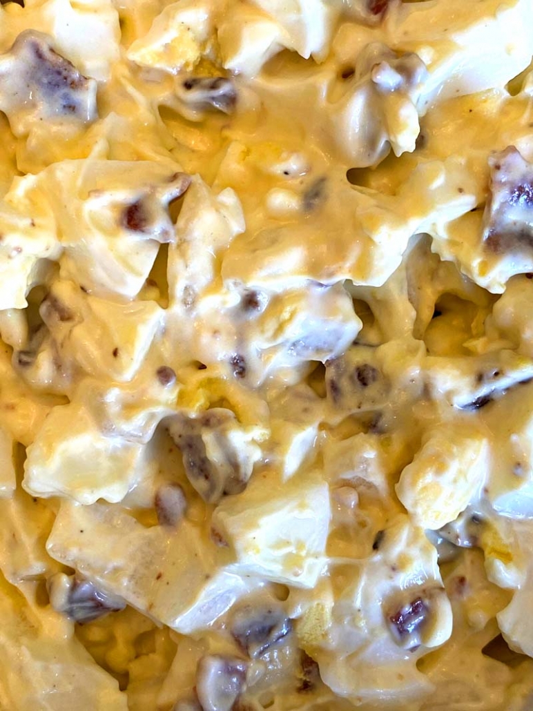 Egg salad with bacon and onions