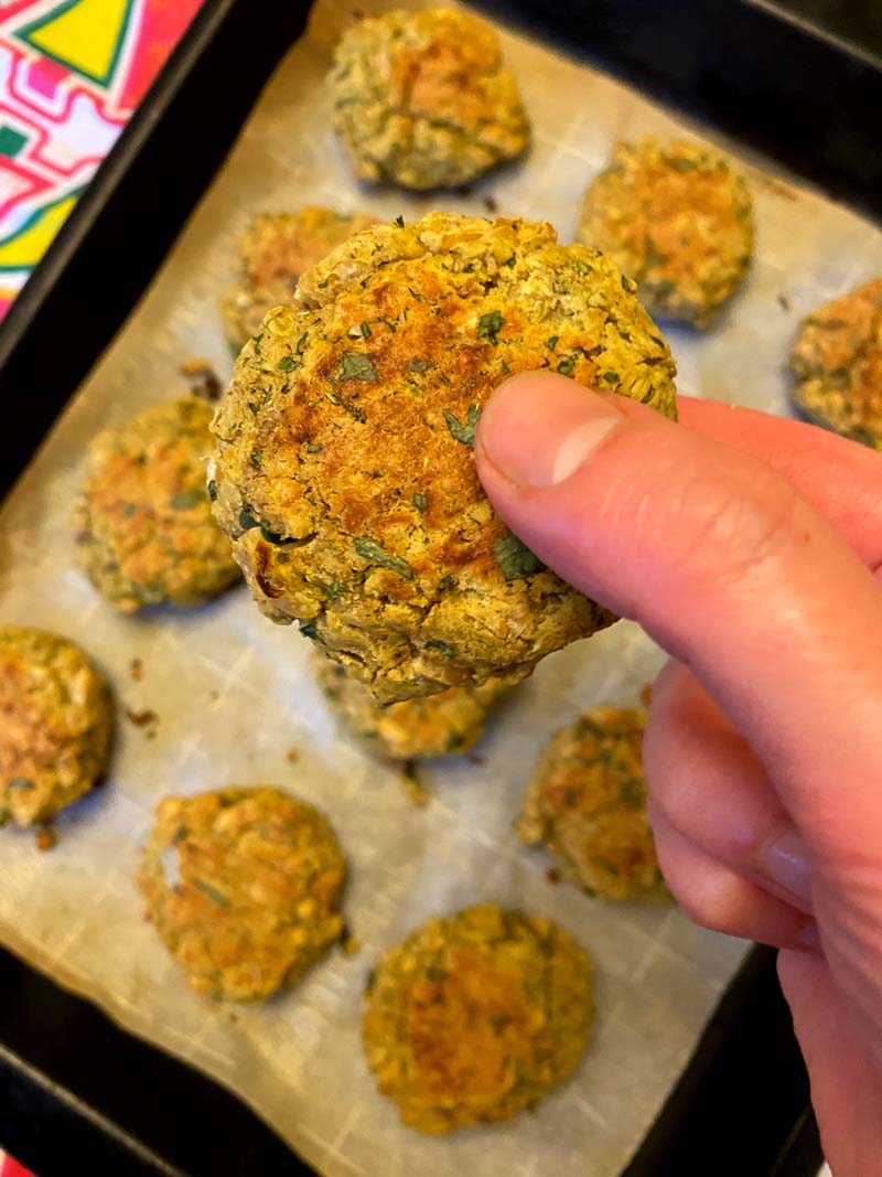 holding a baked falafel