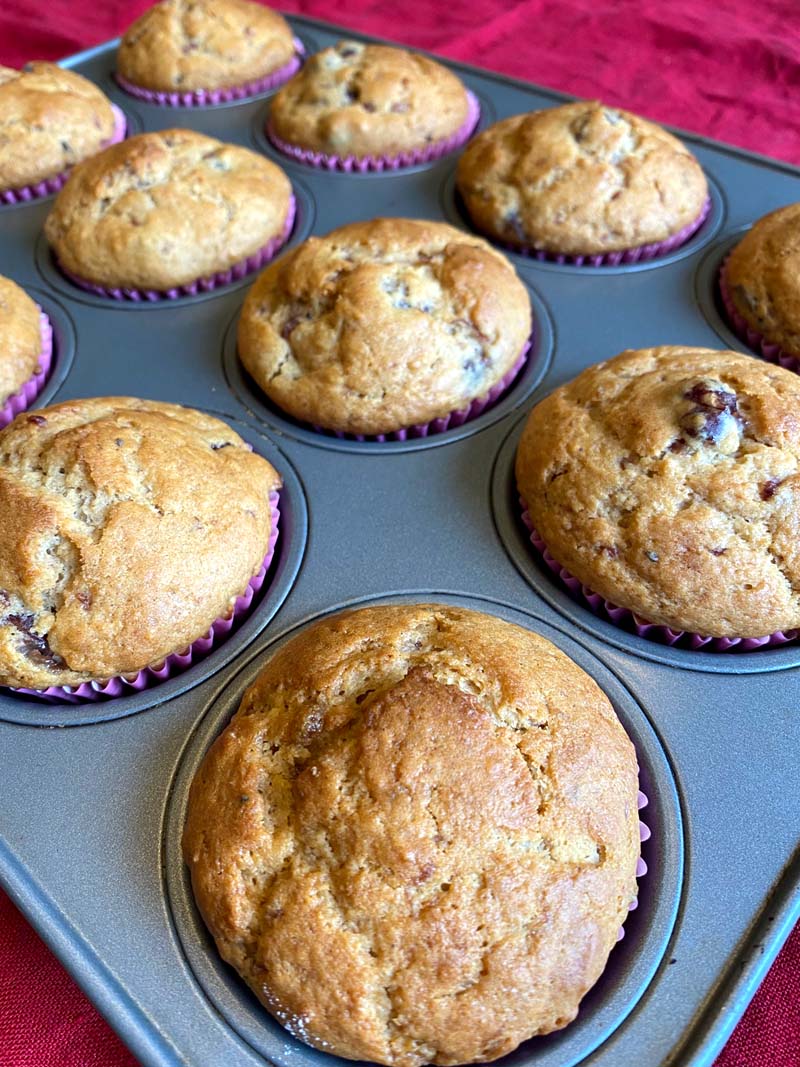 Baked cranberry sauce muffins in a muffin tray