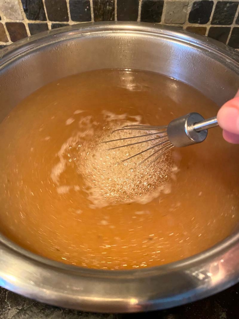 stirring in cornstarch mixture with chicken broth