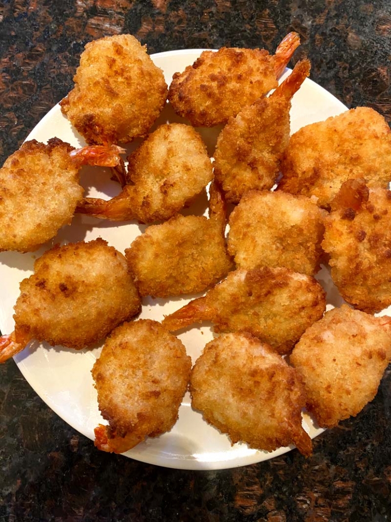 Fried Breaded Shrimp on a white plate 