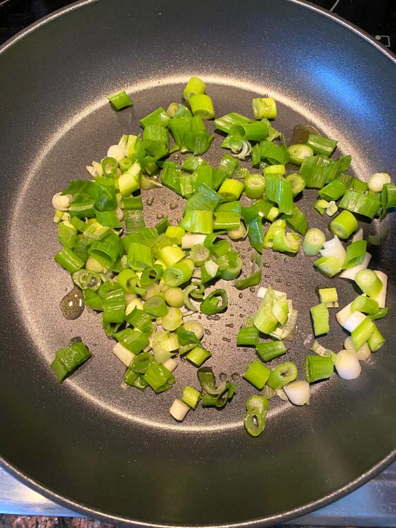 cooking chopped green onions 