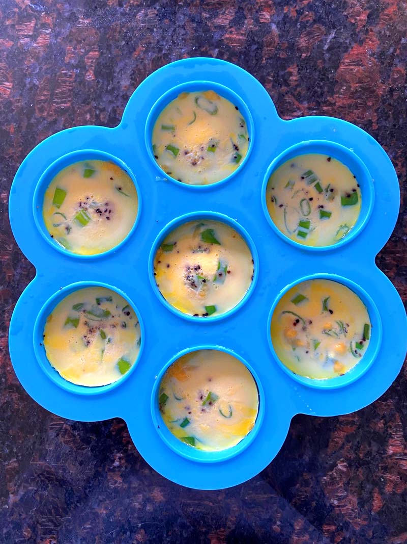 Cooked egg bites in the instant pot mold on a countertop