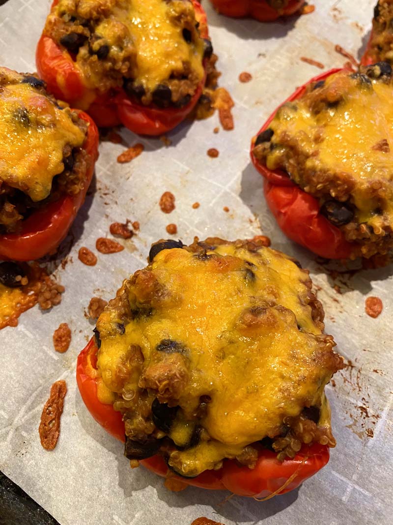 Close up of the baked peppers on parchment paper