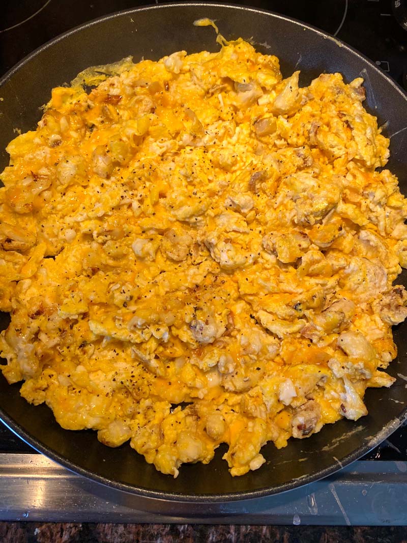 Overhead shot of the cauliflower scrambled eggs in a skillet