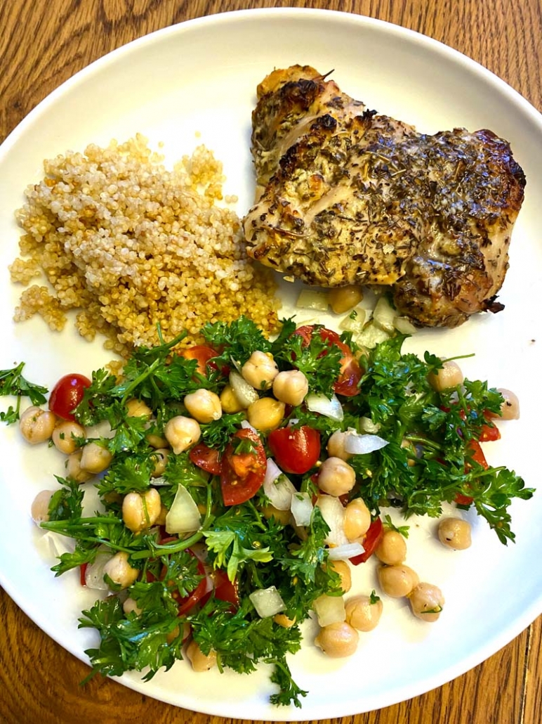 greek lemon chicken thighs with quinoa and tomato cucumber salad