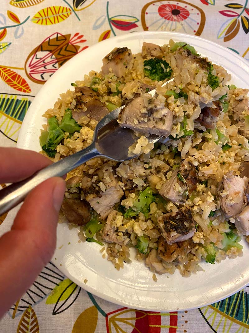 forkful of chicken cauliflower fried rice