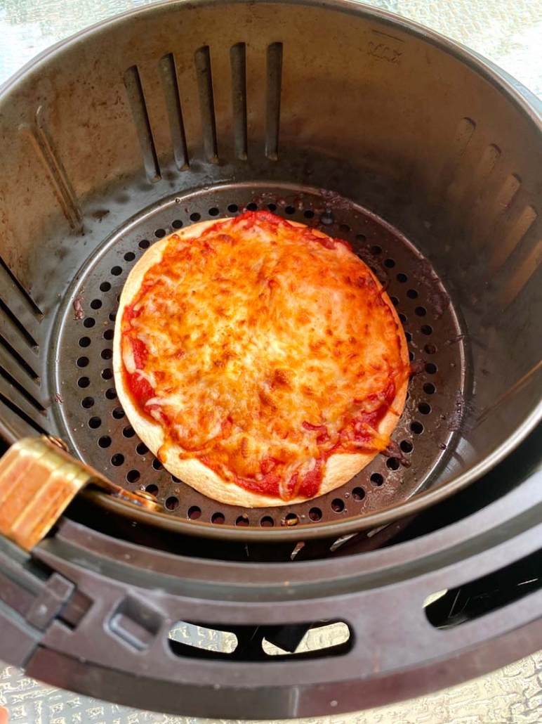 cooking a tortilla pizza in the air fryer 