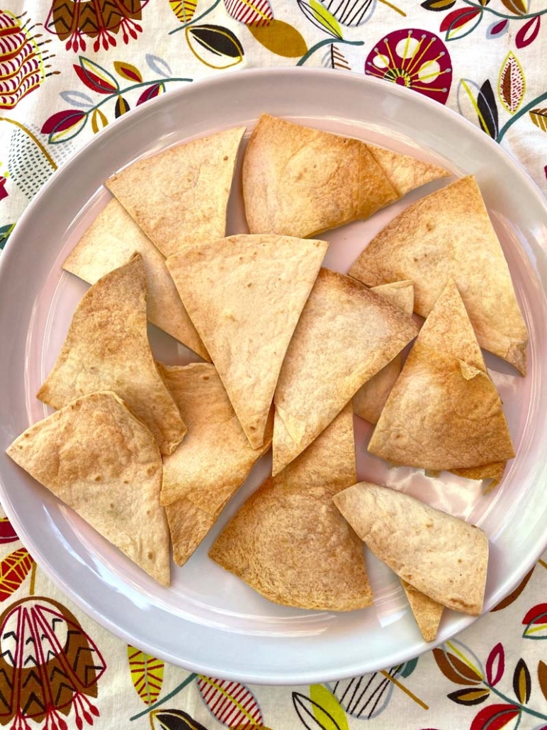 A plate of crispy homemade tortilla chips 