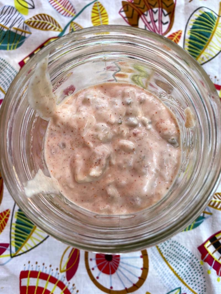 Mixing together the ingredients for homemade thousand island dressing