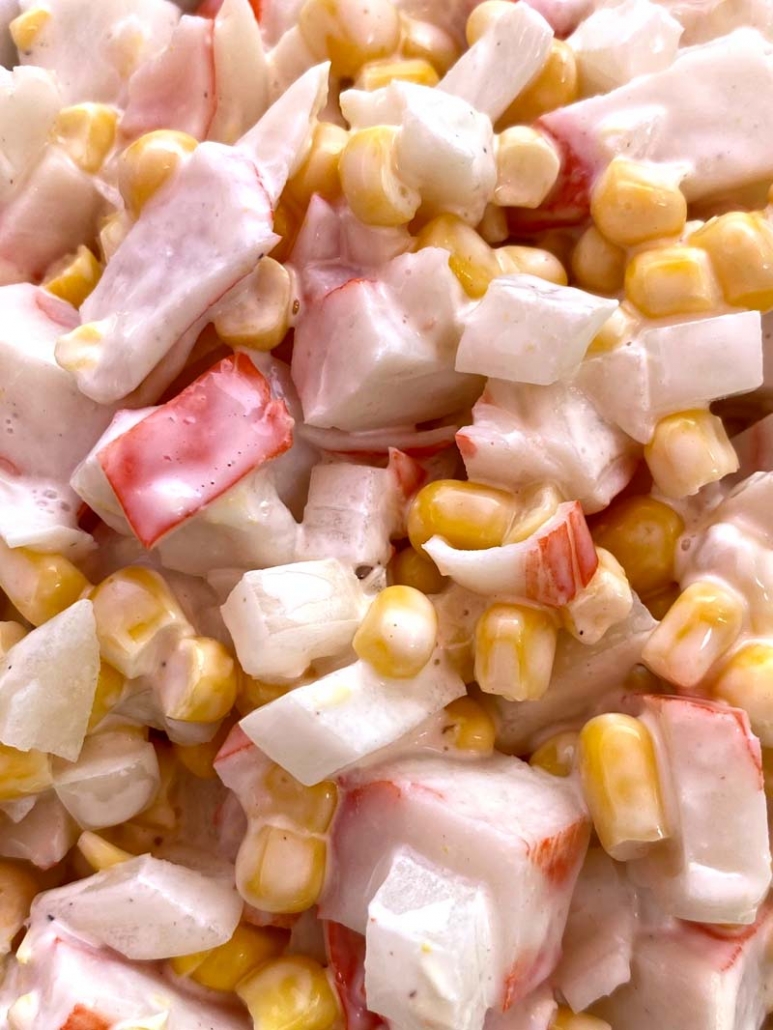 A close up of crab and corn salad 