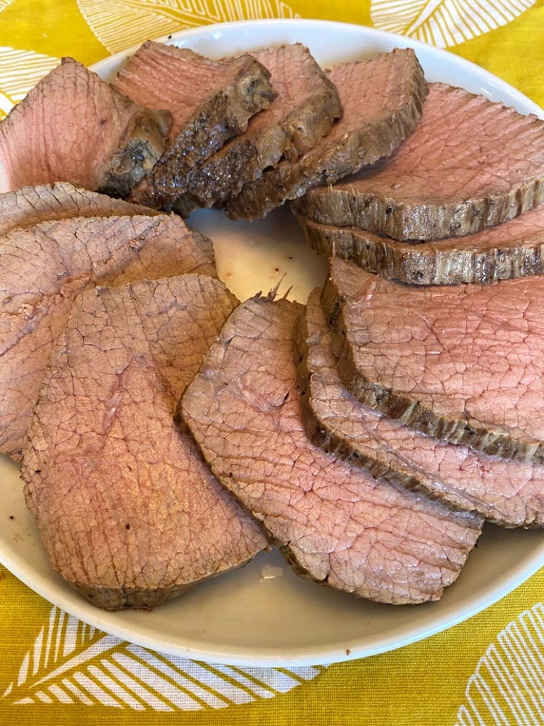 Arranging Eye of Round Beef Roast in a circle on a plate