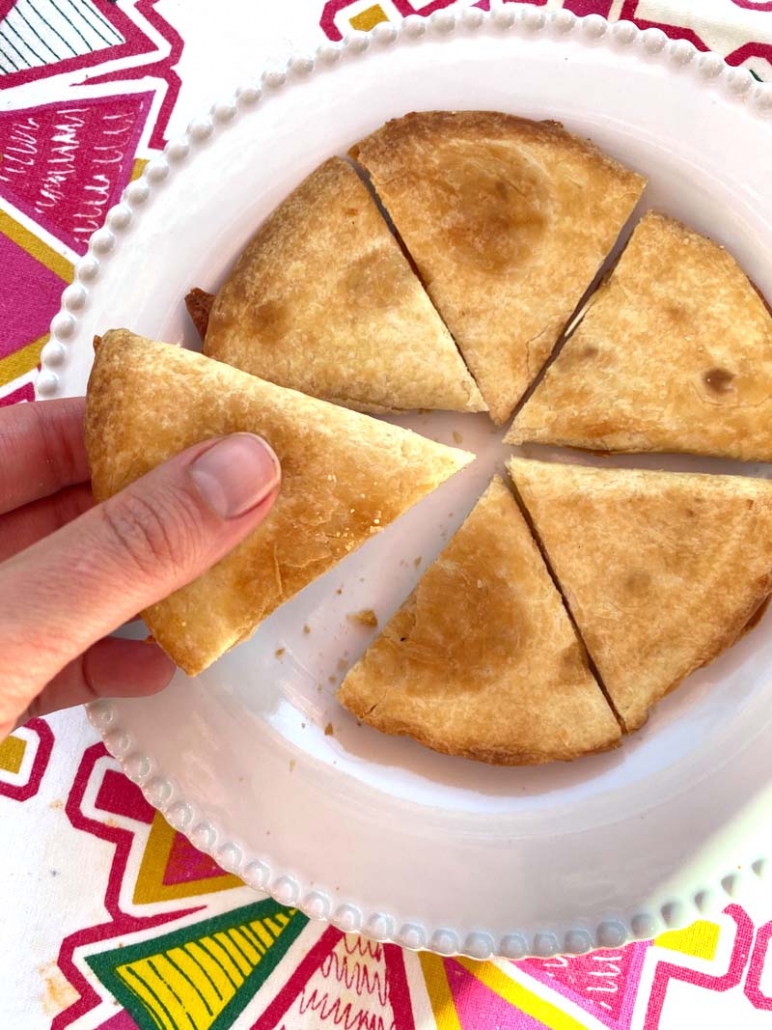 cut up quesadilla with cheese