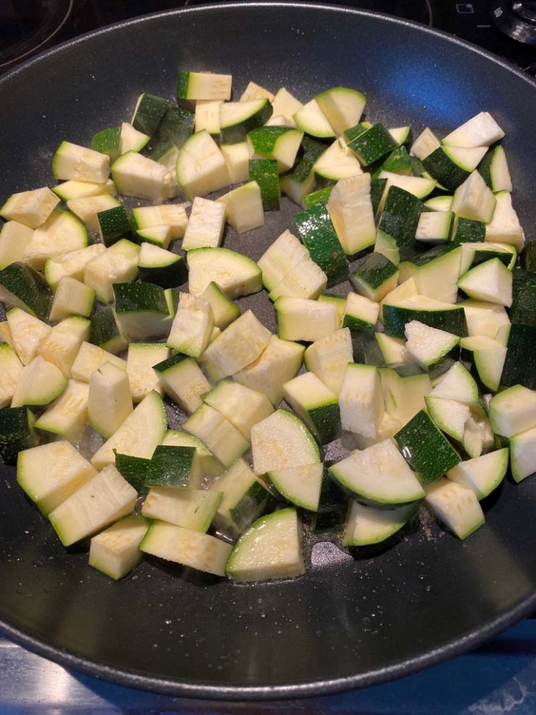 raw chopped zucchini in a pan