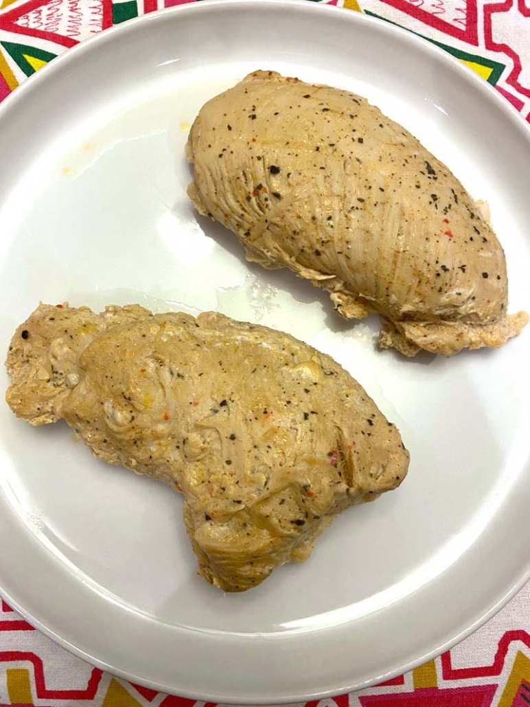 Cooked Turkey Breast Tenderloins on a white plate 