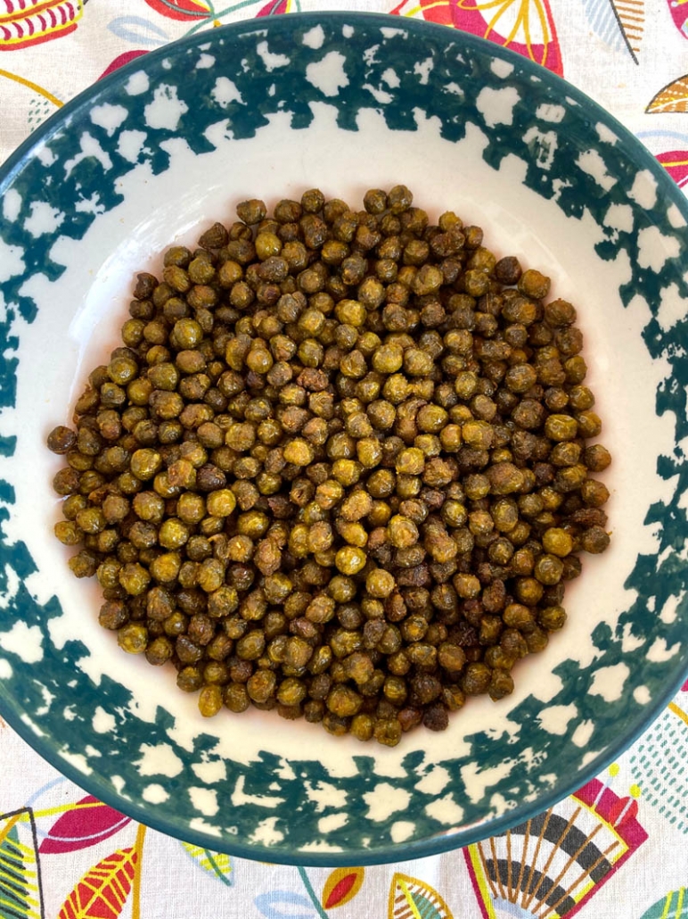 a bowl of air fried green peas