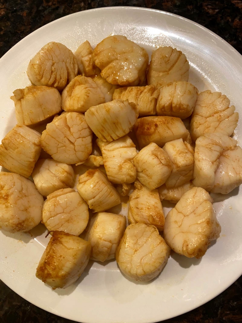 scallops on a white plate 