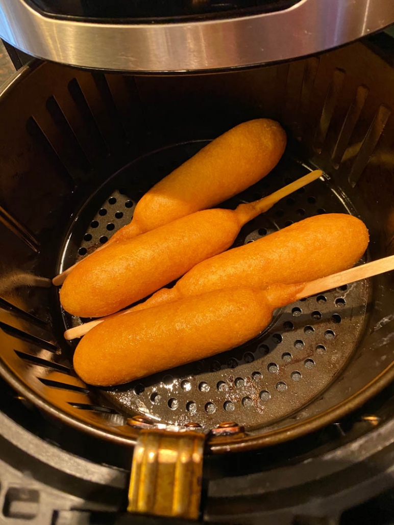 corn dogs in the air fryer cooking 