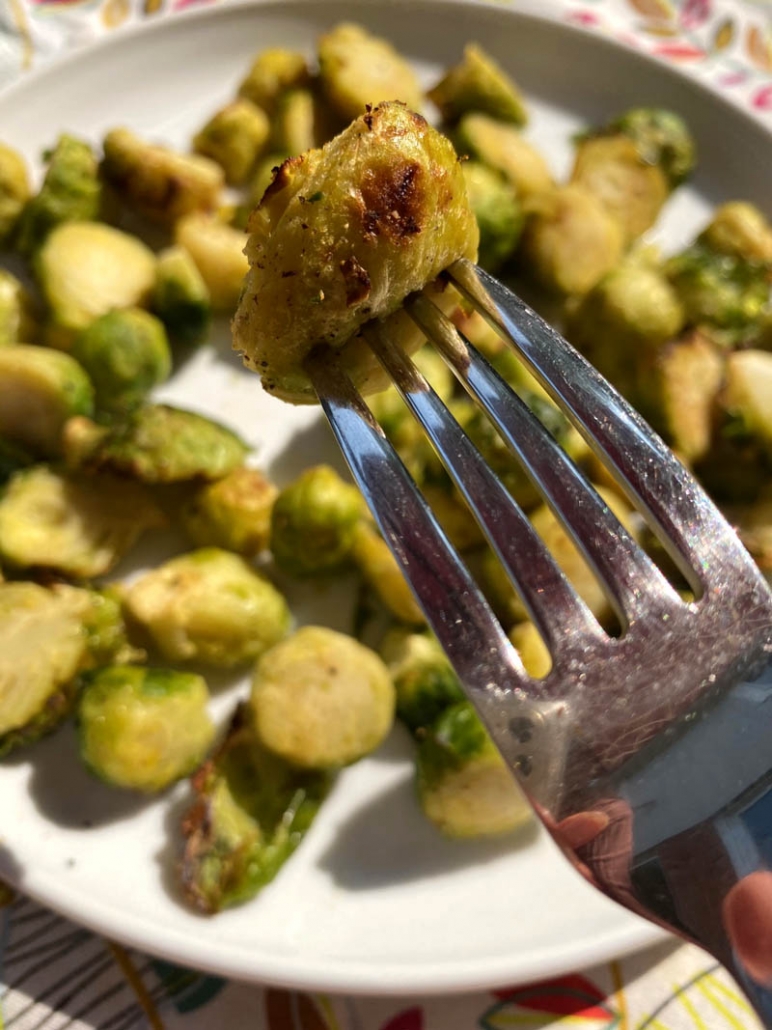 brussel sprouts on a white plate 