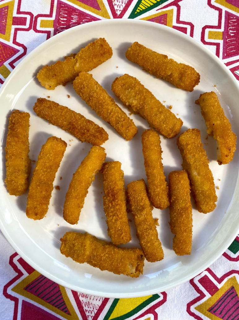 a plate full of fish sticks 