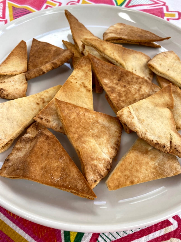 a plate full of pita chips