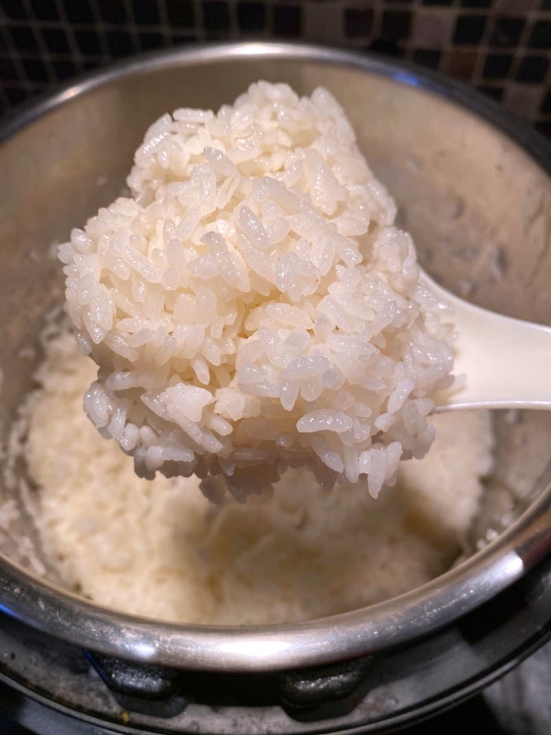 a scoop of sticky sushi rice 
