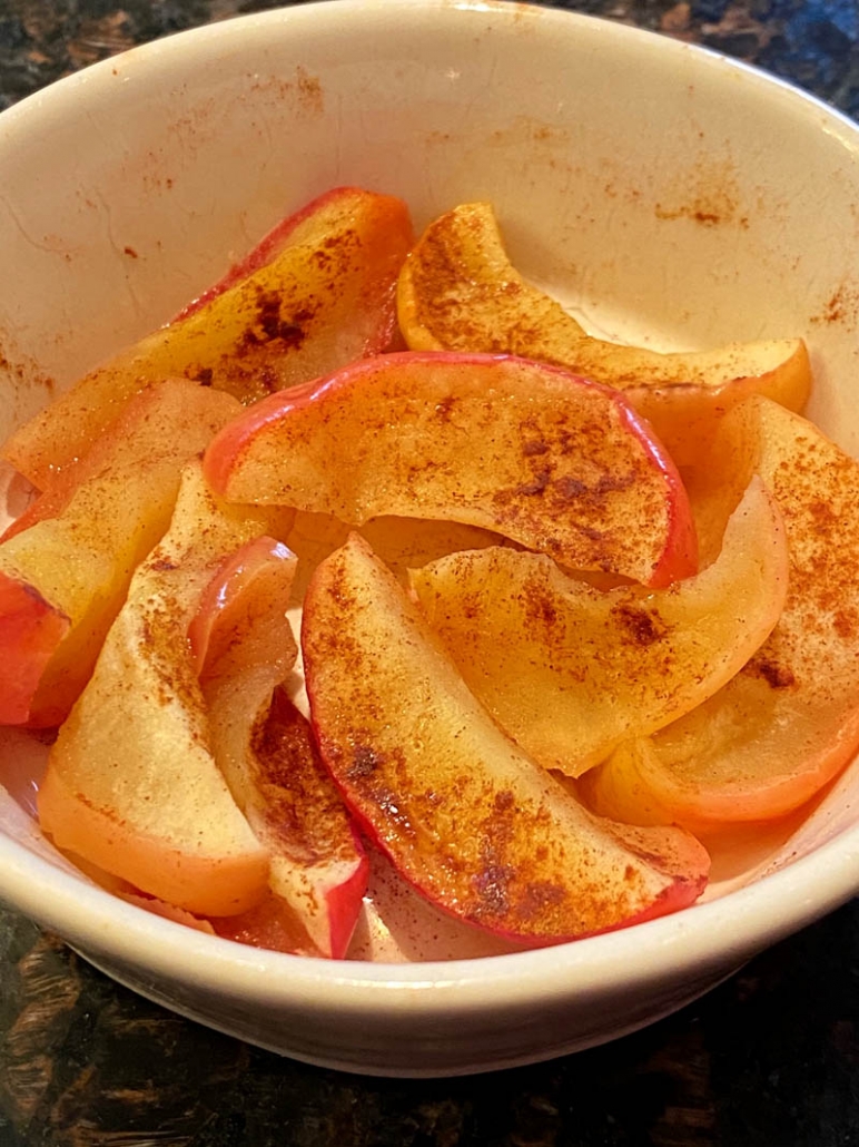 baked apple slices with cinnamon on top