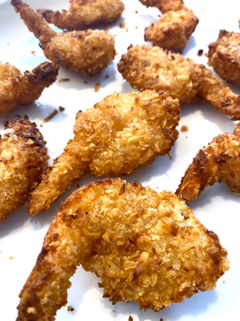 sweet coconut shrimp on a white plate 