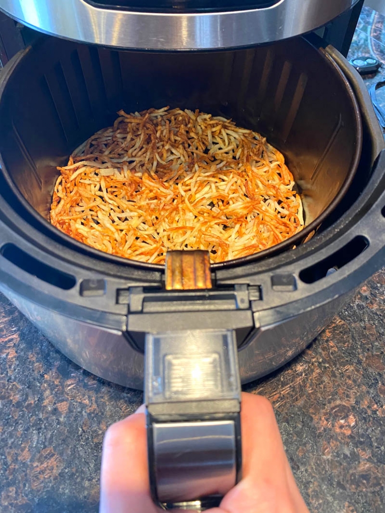 crispy hashbrowns in the air fryer basket 