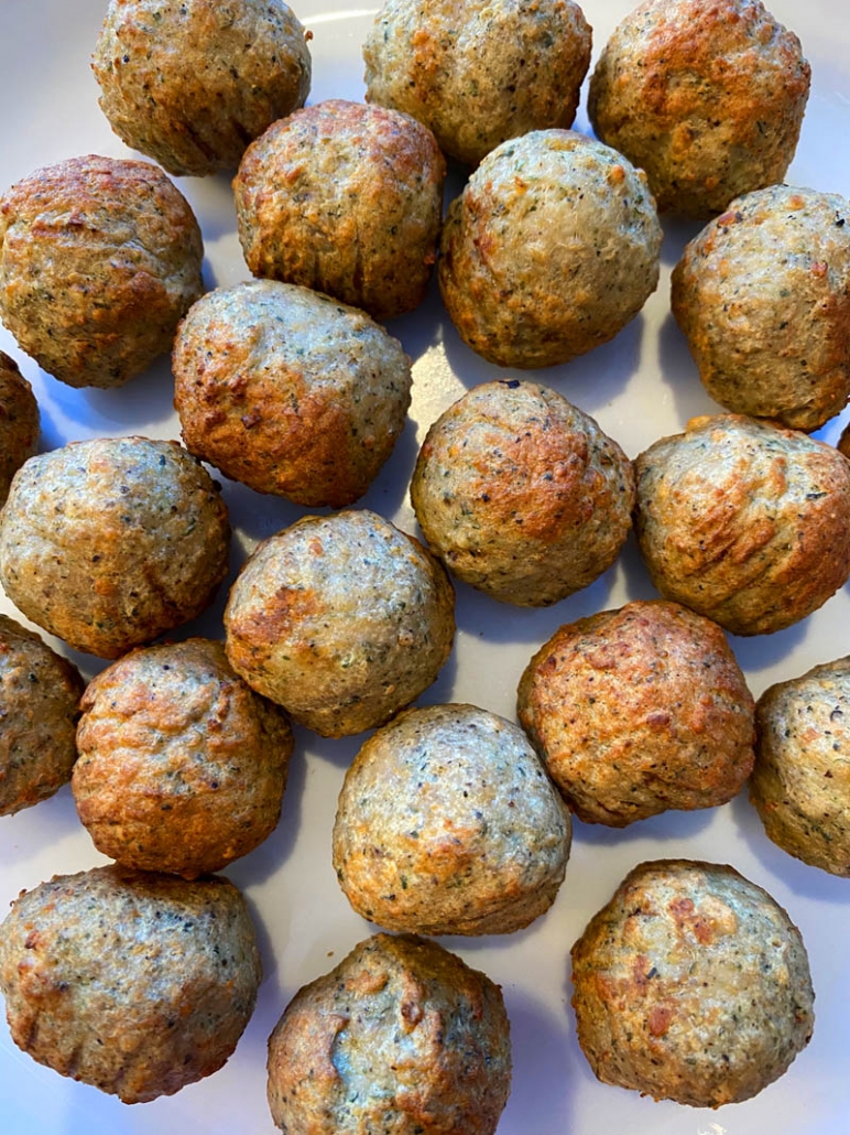 air fryer frozen meatballs on a white plate 