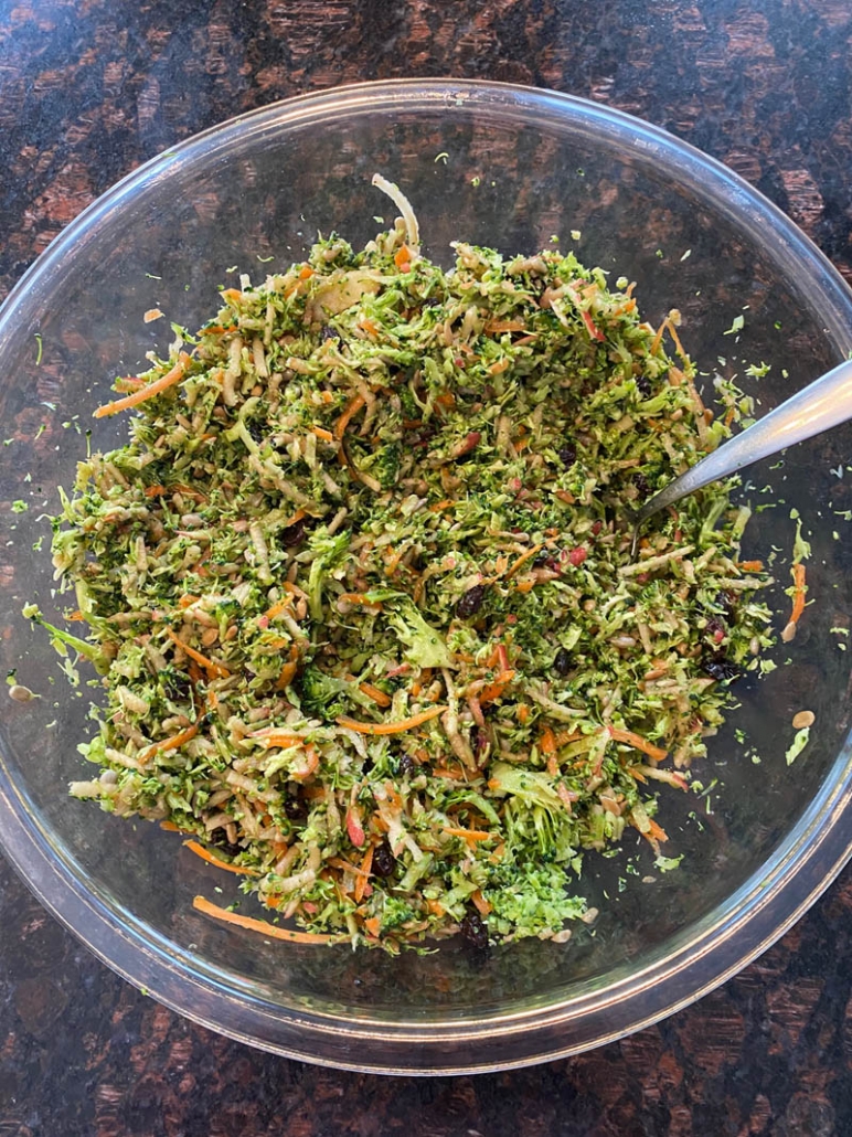 mixing the broccoli salad 