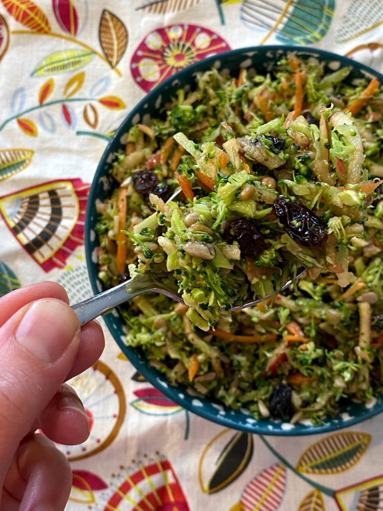 bowl of broccoli salad with apples 