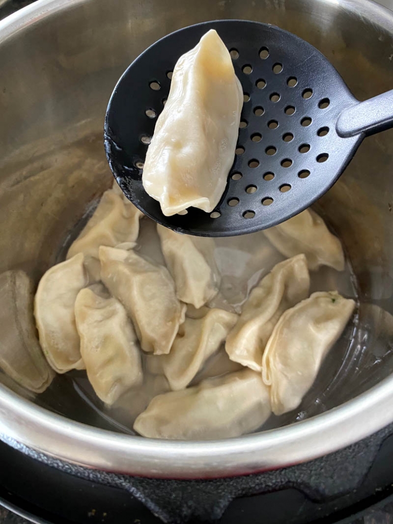 scooping out a dumpling 