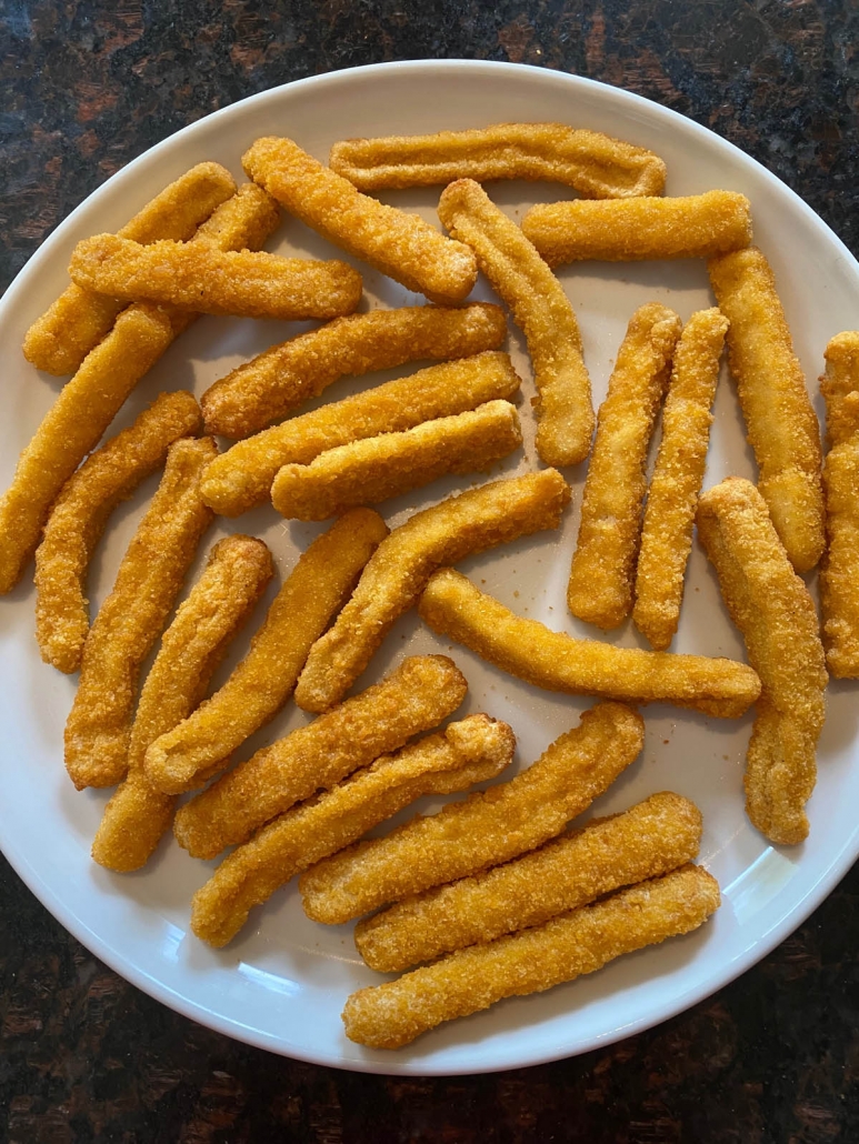 a plateful of crispy chicken fries 