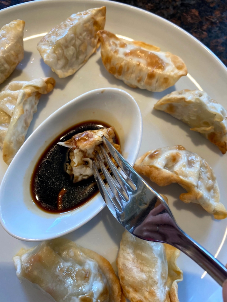 air fryer potstickers served with dipping sauce