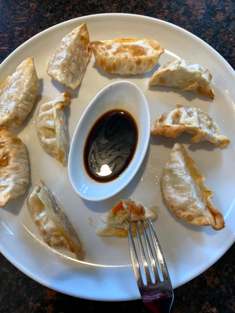 frozen dumplings cooked in the air fryer on a plate