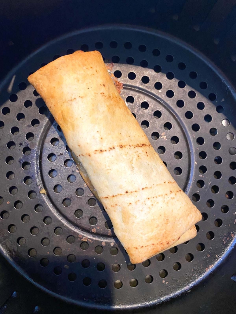 close up of chimichanga in air fryer