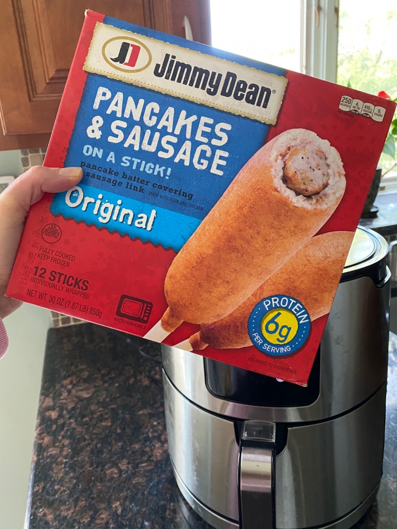 a box of jimmy dean pancakes and sausages on a stick 