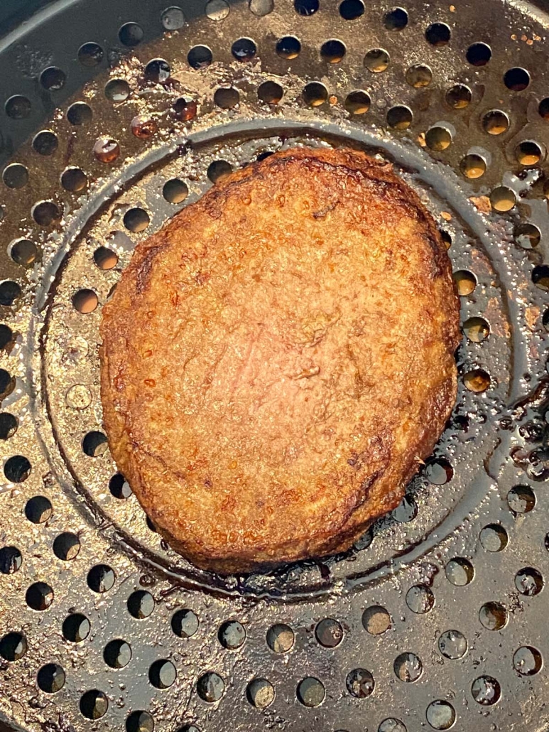 close up of cooked turkey burger in the air fryer
